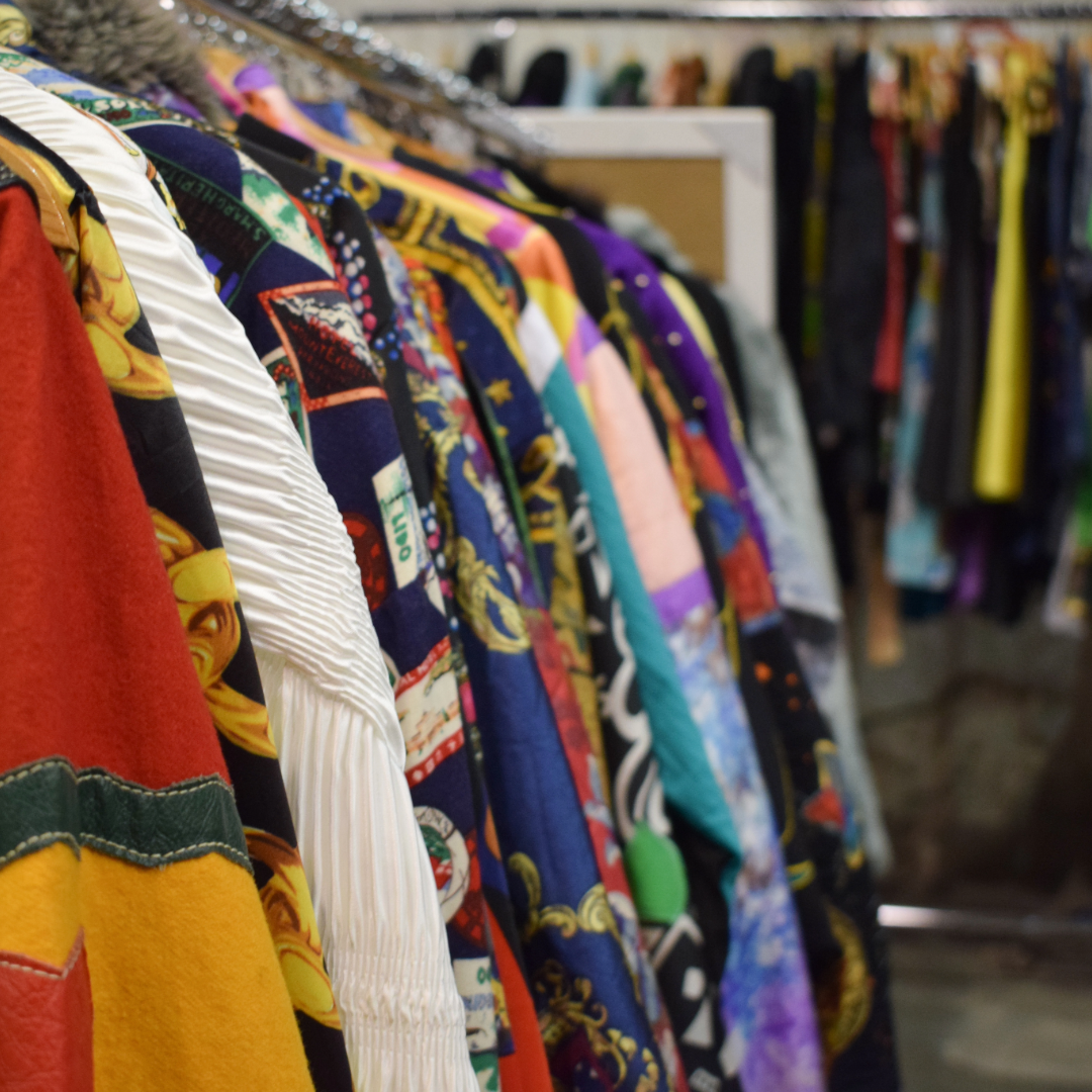 Thrifted clothing on a rack
