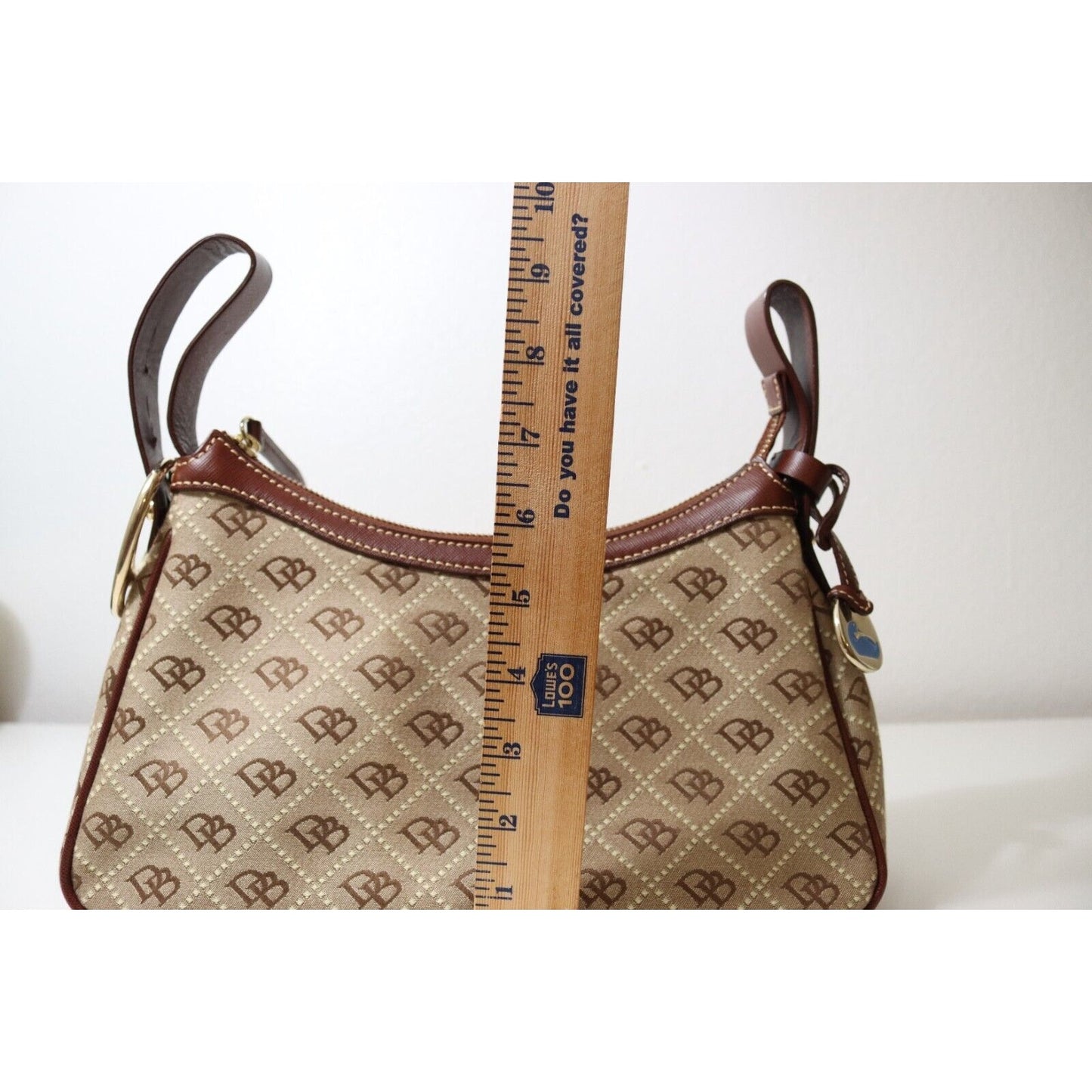Dooney and Bourke Monogram Brown and Beige Bag Flaw No Strap