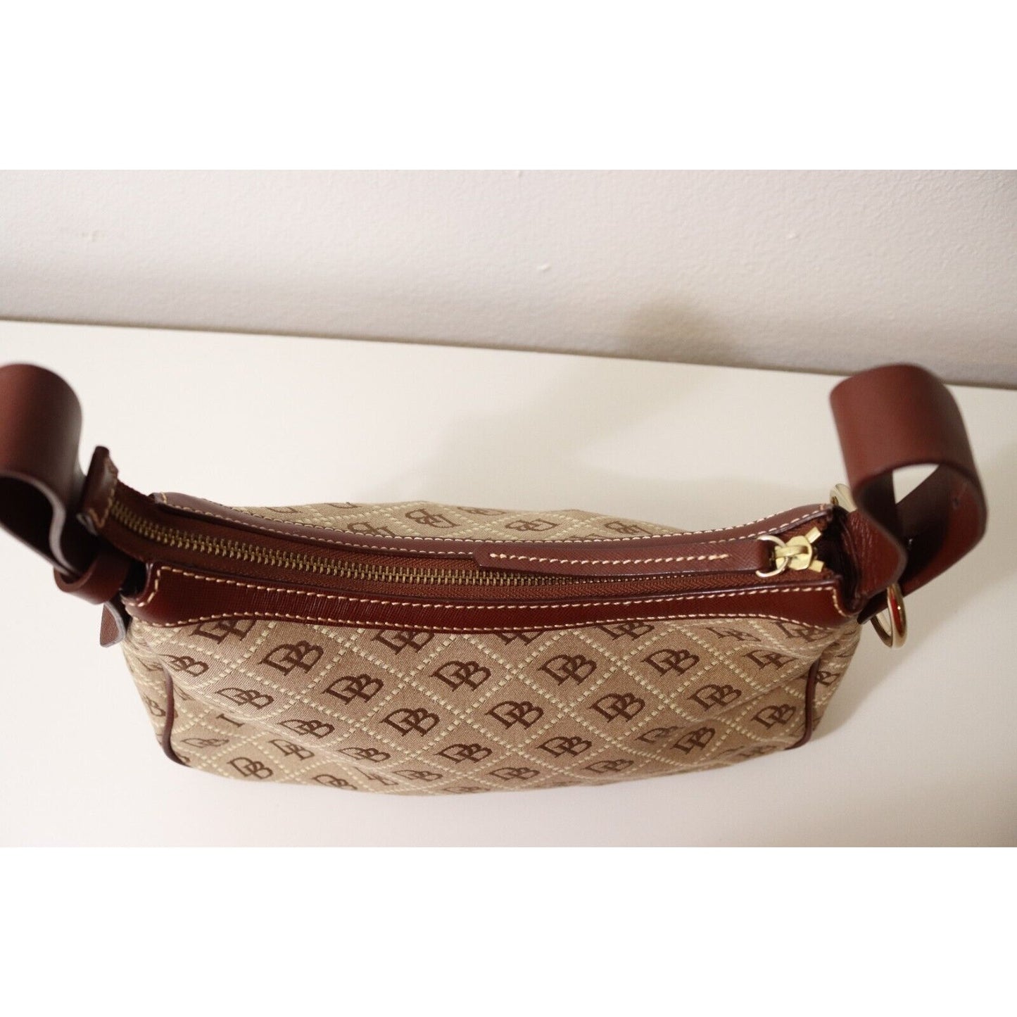 Dooney and Bourke Monogram Brown and Beige Bag Flaw No Strap