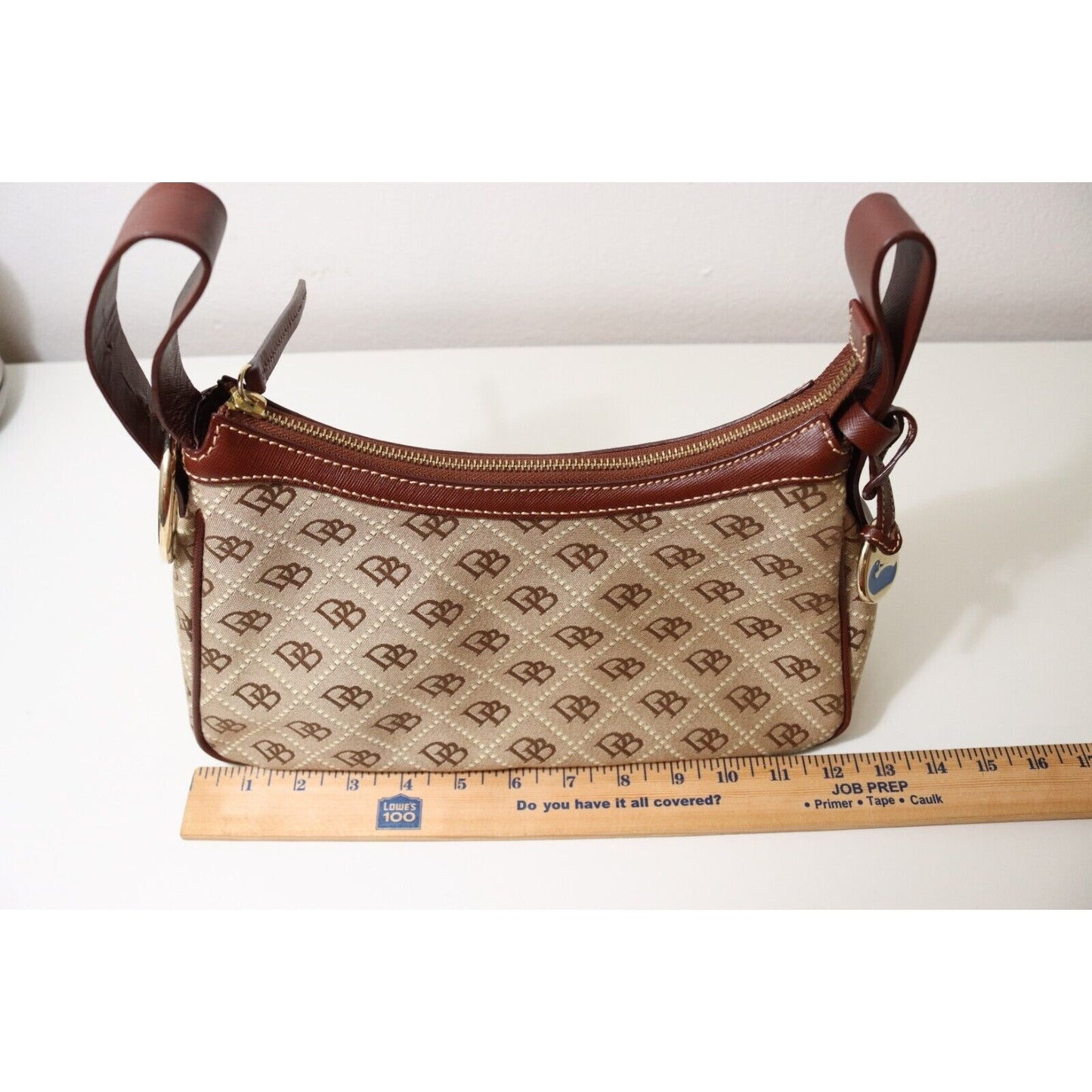 Dooney and Bourke Monogram Brown and Beige Bag Flaw No Strap